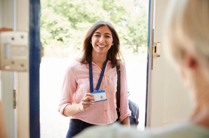 worker at door with pass